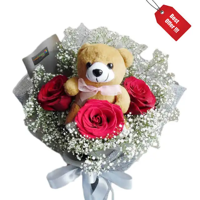 teddy bear with rose bouquet